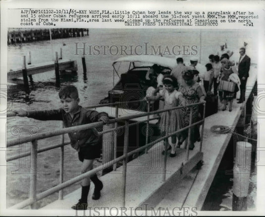 1965 Cuban refugees arriving in Key West, Florida aboard MMM Yacht - Historic Images