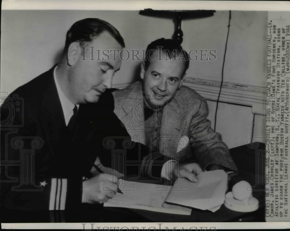 1944 Press Photo Lt. Comdr. James Crowley Signs to Coach Boston Yankees - Historic Images