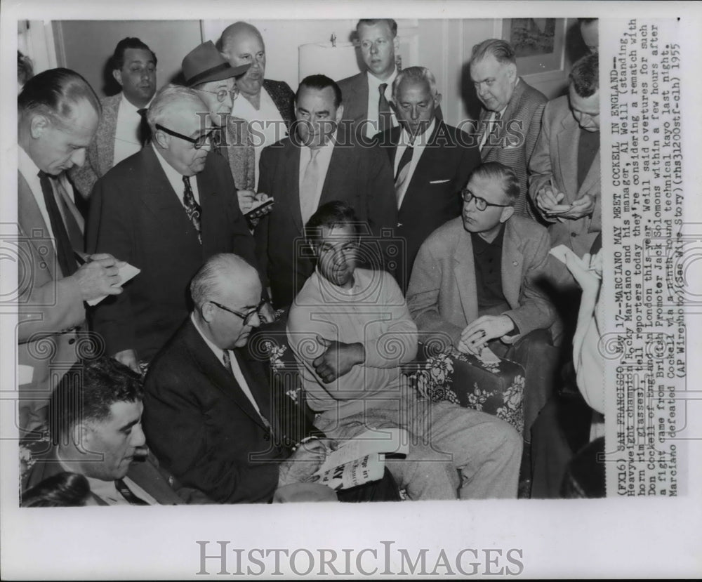 1955 Press Photo Boxer Rocky Marciano &amp; manager Al Weill in a press conference - Historic Images