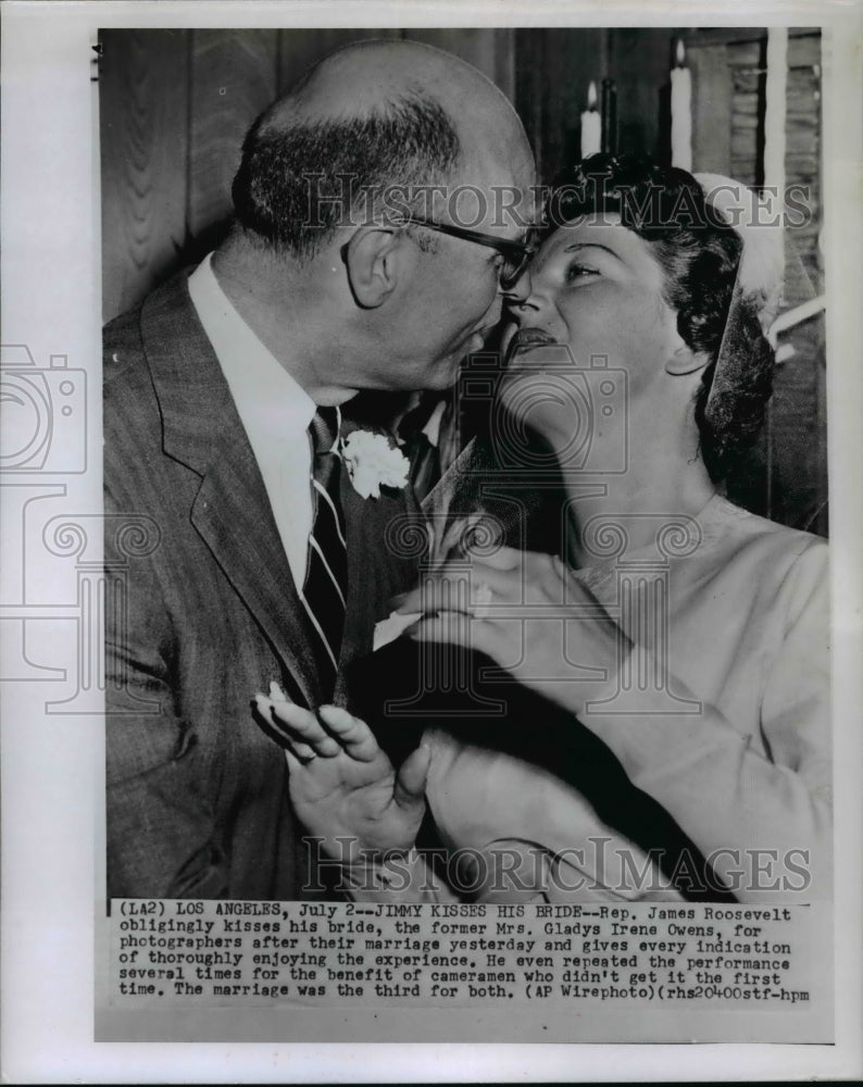 1956 Press Photo Rep. James Roosevelt kisses his bride, Gladys Irene Owens - Historic Images