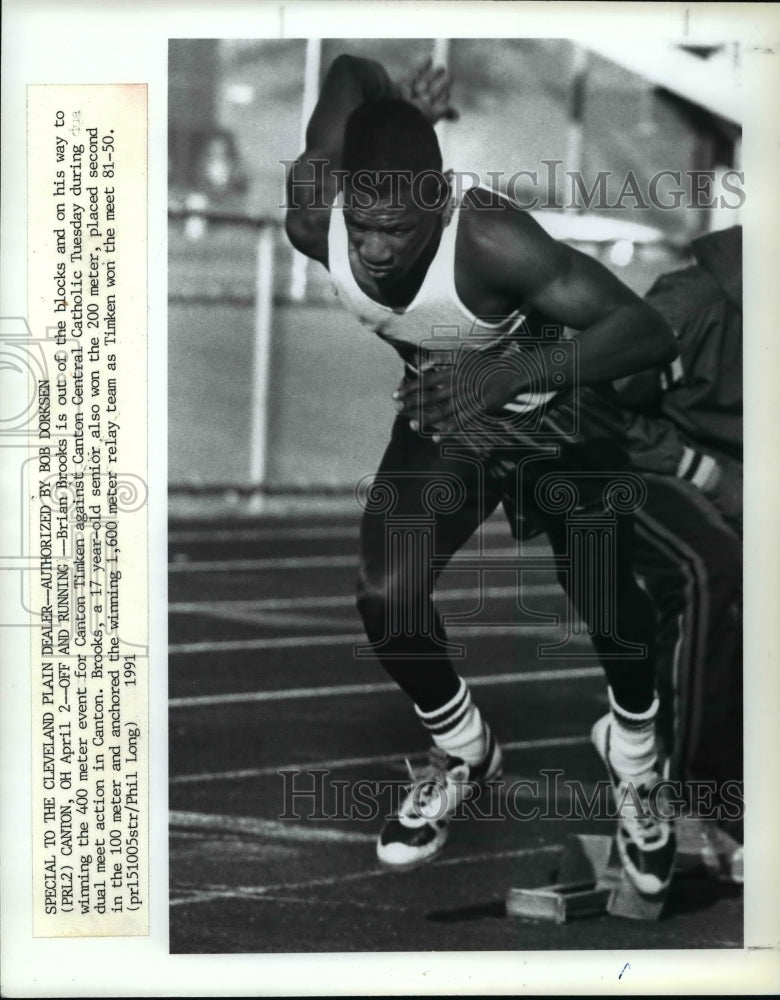 1991 Brian Brooks, runner, leads Timken team during the dual meet - Historic Images