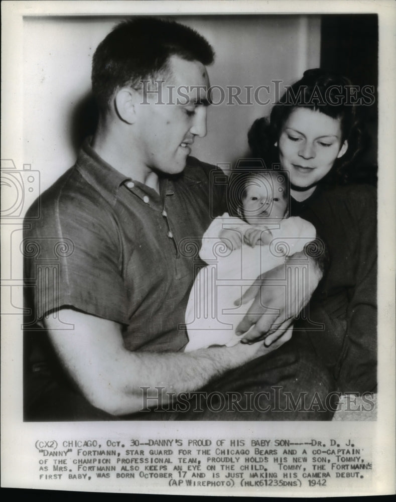 1942 Press Photo Dr. D.J. &quot;Danny&quot; Fortmann holding his new son, Tommy- Historic Images