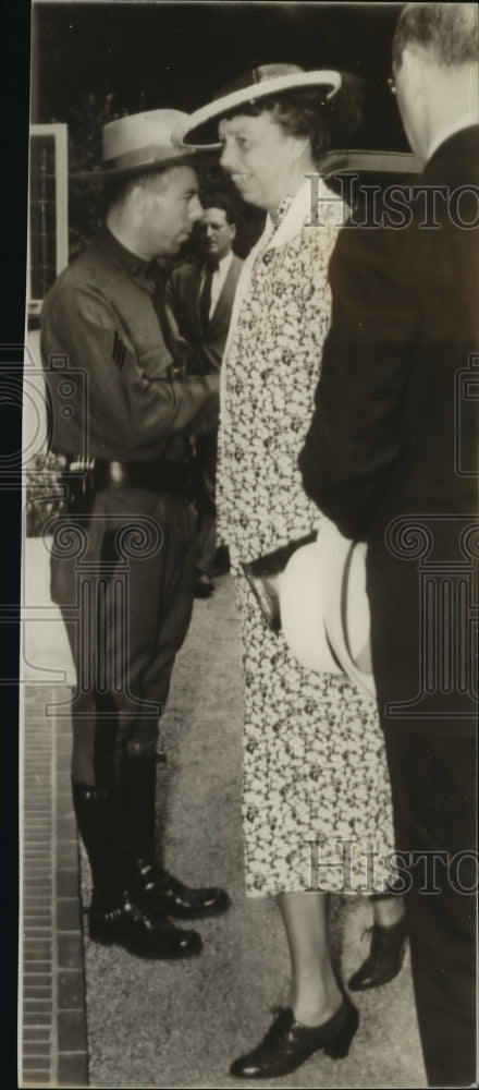 1938 Wire Photo Mrs Franklin D Roosevelt walks past a policeman - cvw26928 - Historic Images