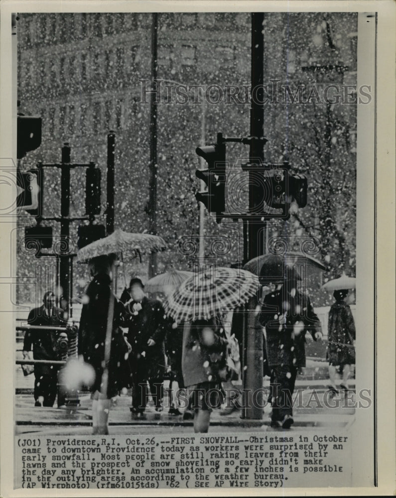 1962 Wire Photo Early snowfall surprises people in downtown Providence - Historic Images