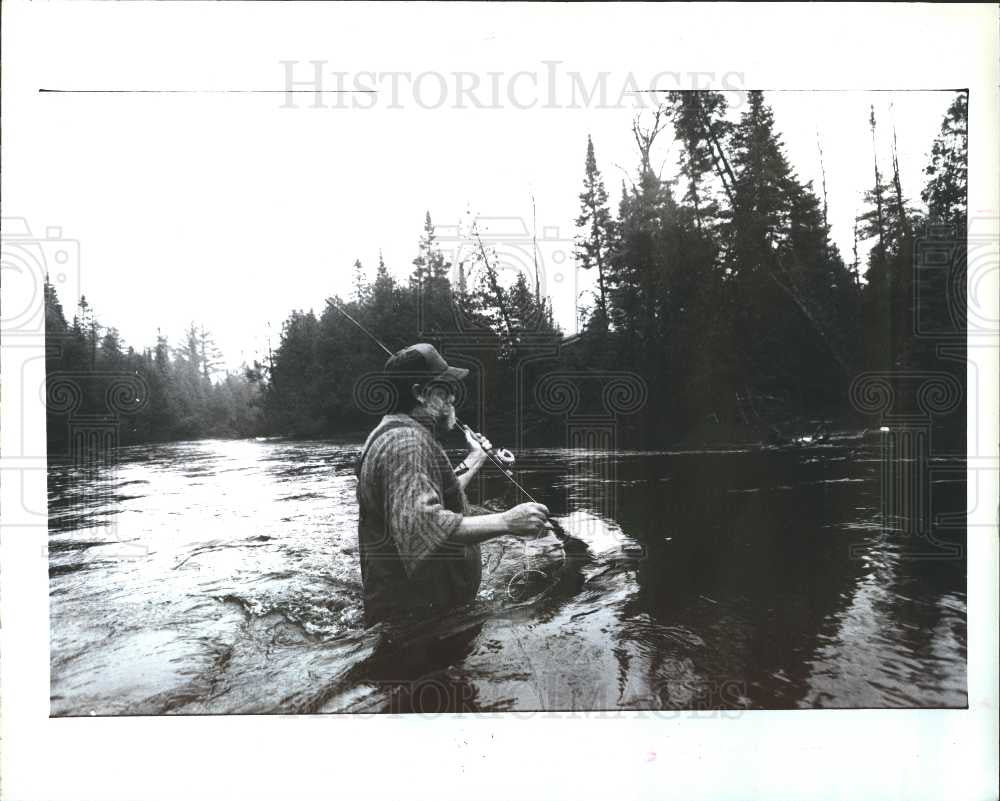 1982 Press Photo Fisherman river waistdeep trout season - Historic Images