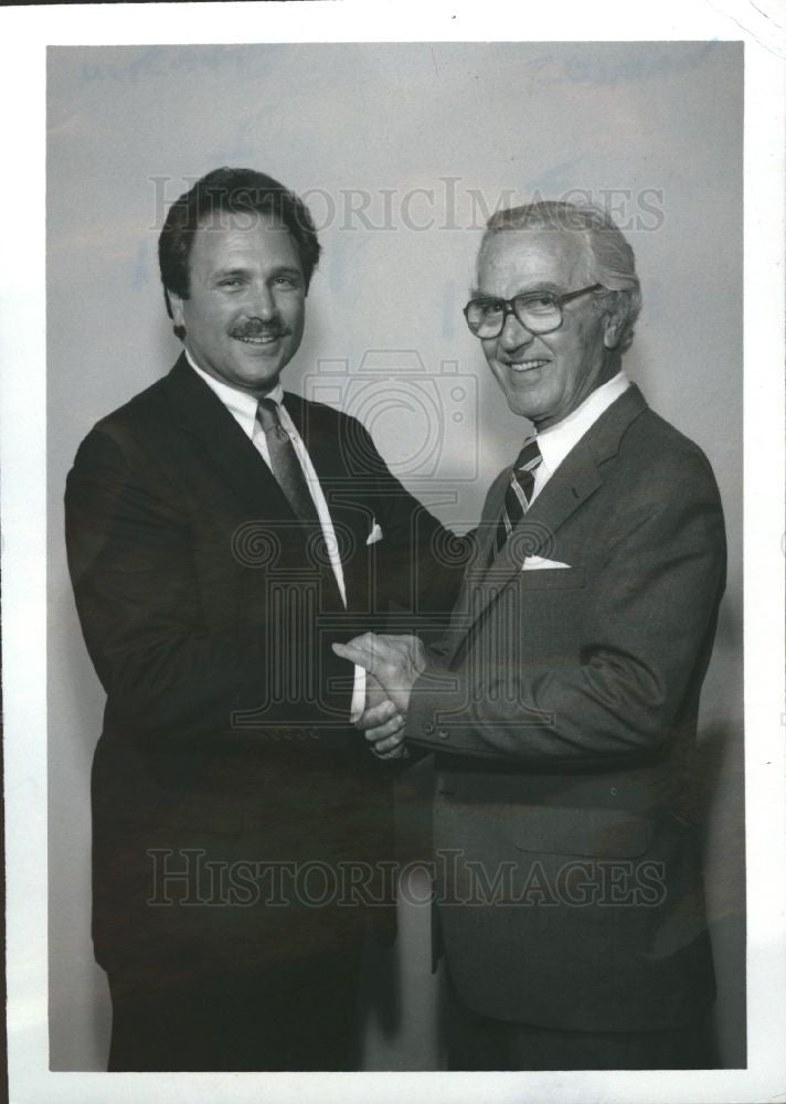 1985 Press Photo Cushman Wakefield Join Largest Mich. - Historic Images