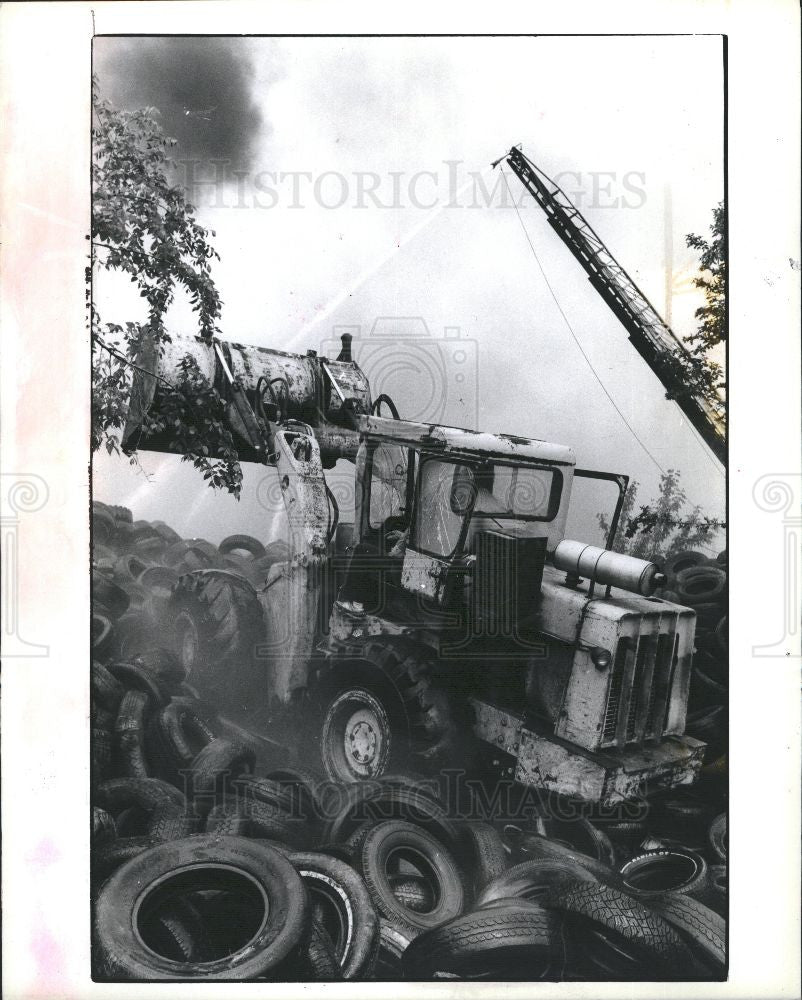 1990 Press Photo fire extinguished tire - Historic Images