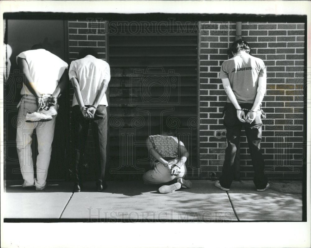 1989 Press Photo Suspects Handcuffed Drug Raid - Historic Images