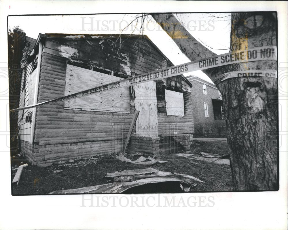 1990 Press Photo Teen dies in blaze, Suspect in custody - Historic Images