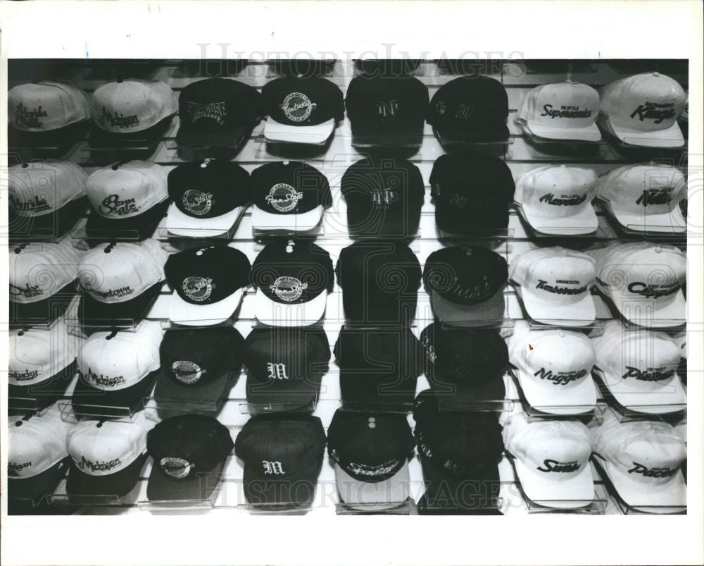 1992 Press Photo Hat Hats Cap Caps Logos Display Sale - Historic Images
