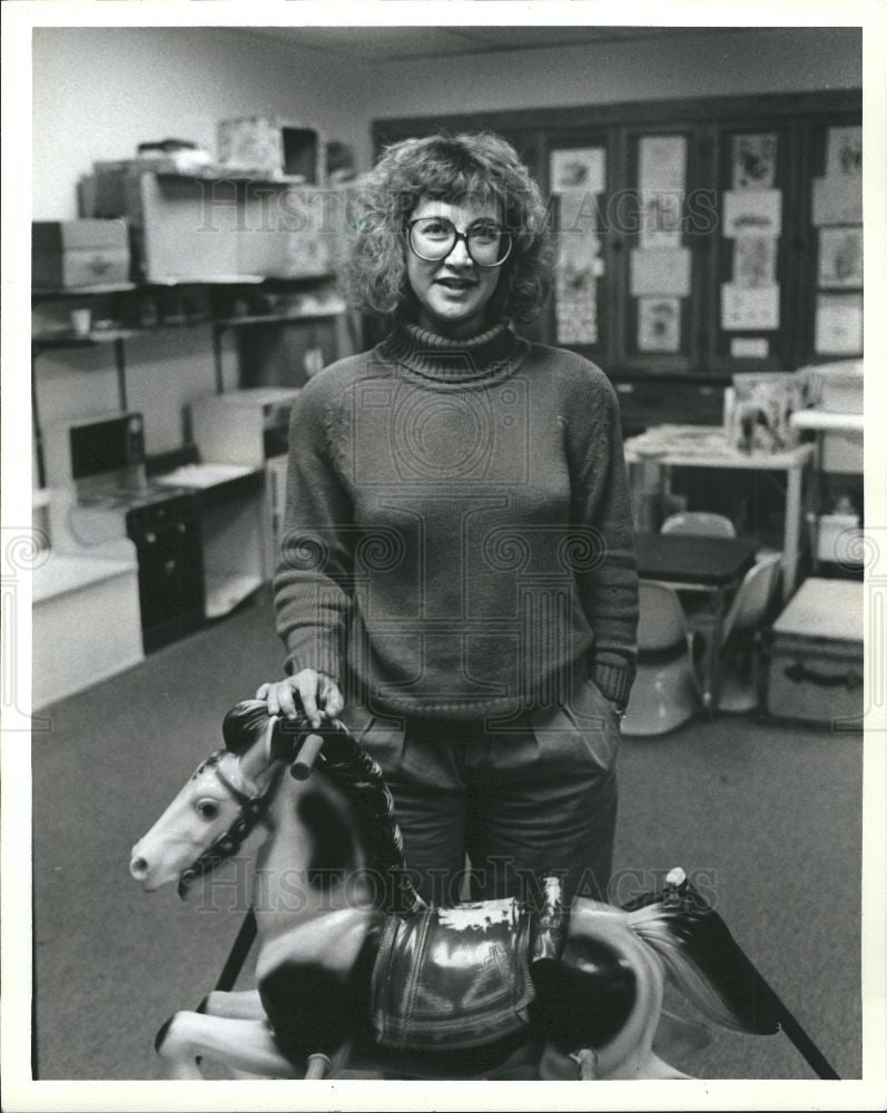 Press Photo Debi Cain in children&#39;s toys room - Historic Images