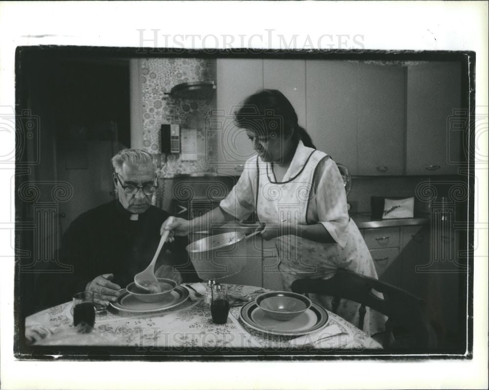 1988 Press Photo Father Lawrence Fares Christina Grice - Historic Images