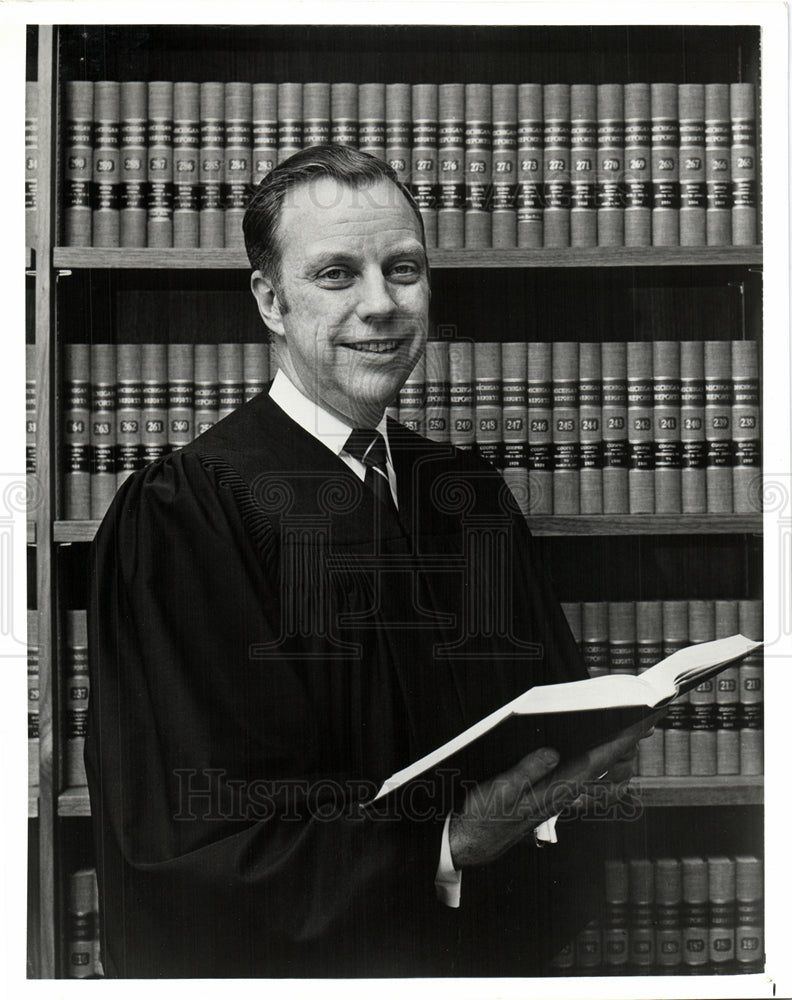 danley judge portrait holding book-Historic Images