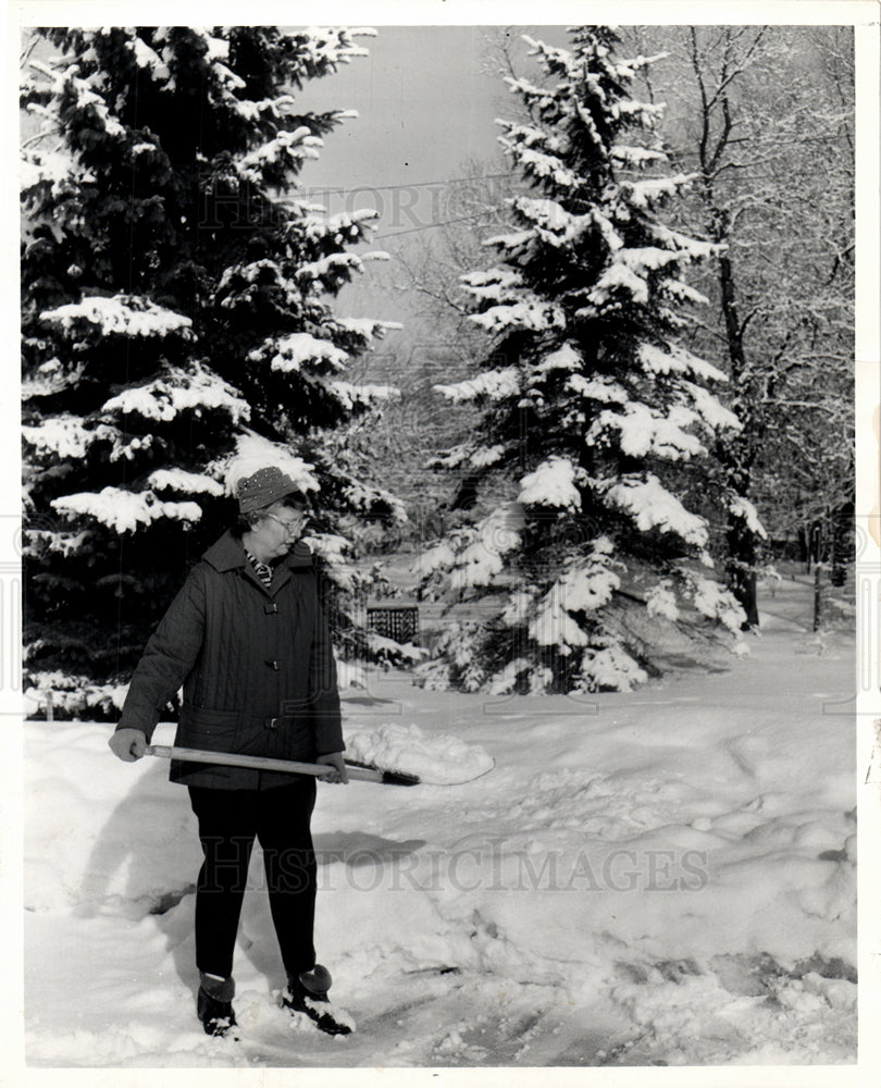 1960 Bert Stoll shovels East Tawas snow-Historic Images