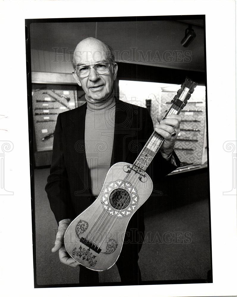 1980 Dr. Warner is holding Baroque Guitar-Historic Images