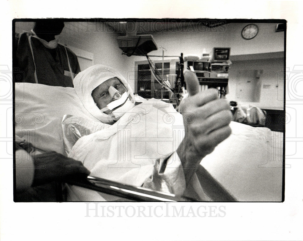 Dell Warner gives a thumbs-up sign-Historic Images