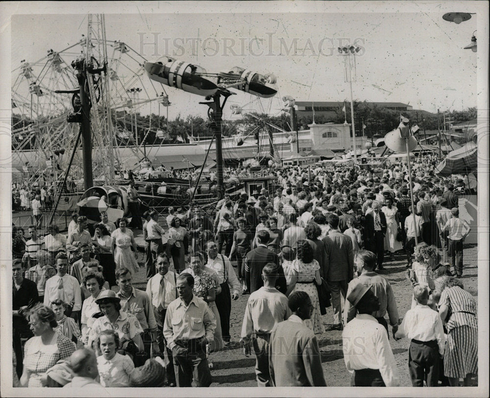 1965 Hanging baskets of flowers fill empty - RRU19087 - Historic Images