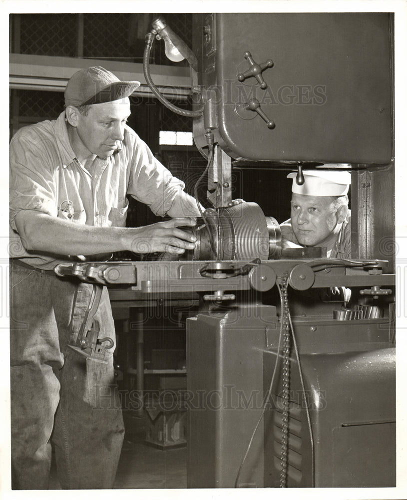 1949 operating metal Bood Saw G.Kerley-Historic Images