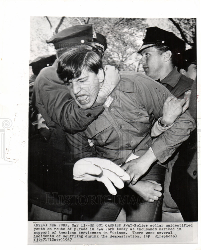 1967 Police collar unidentified youth away-Historic Images