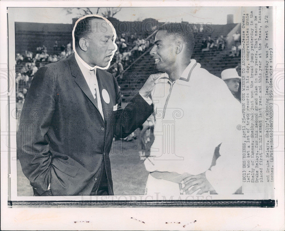 1959 Jesse Owens, congratulates Ernie Shelb-Historic Images