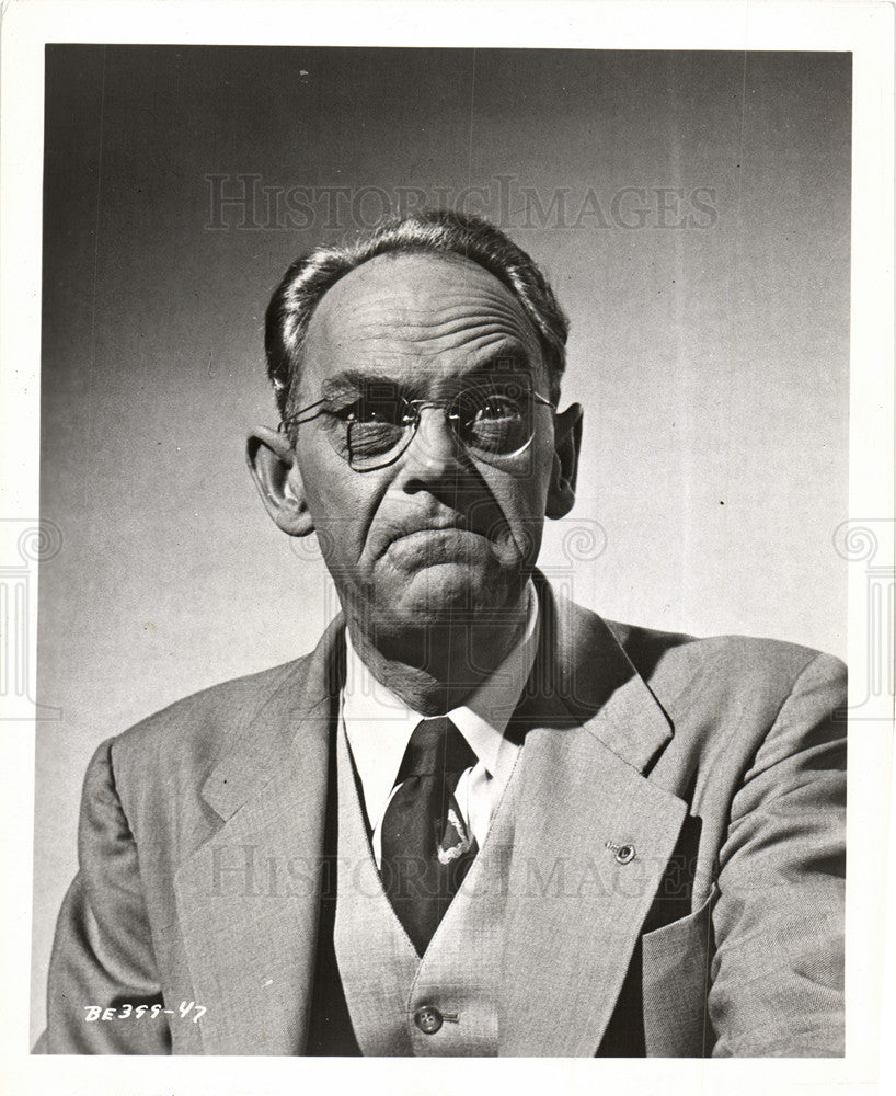 1956 Press Photo Scientist Sitting in Office Chair - Historic Images