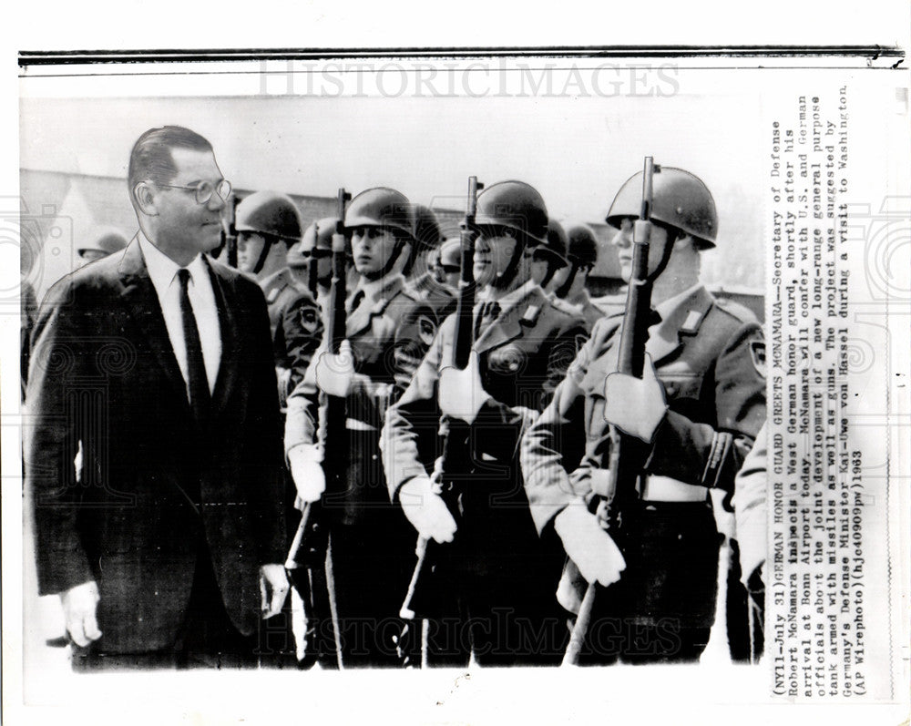 1963 Press Photo Robert McNamara Inspect Guard Airport - Historic Images