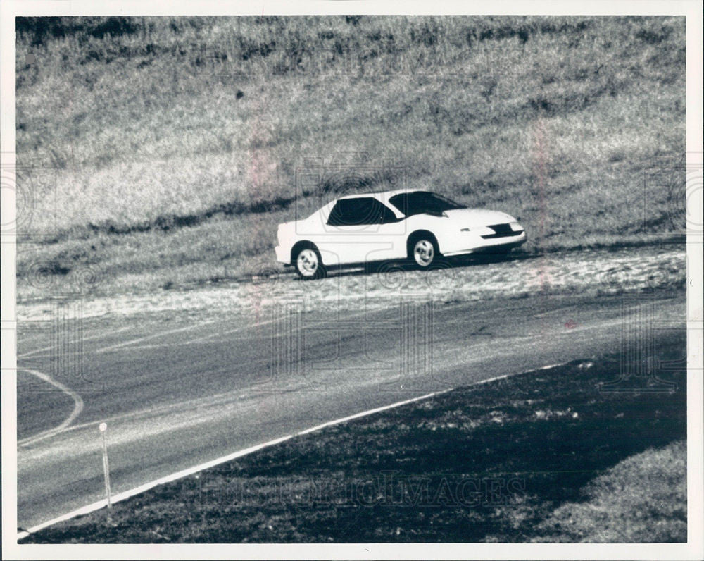 1989 Press Photo Spy photos GM Saturn coupe sedan 2+2 - Historic Images