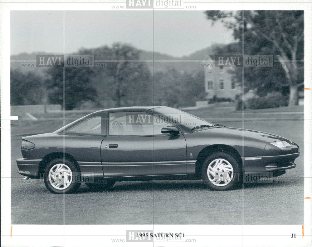 1994 Press Photo 1995 Saturn SC1 Coupe injection system - Historic Images