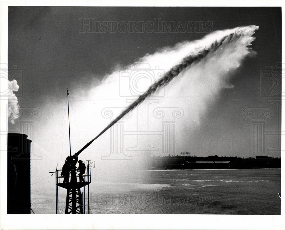 Press Photo Fire Fighters Spray Fire - Historic Images