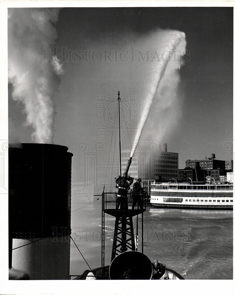 Press Photo Firemen Spray Water At Fire - Historic Images