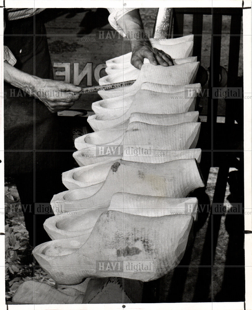 1957 Press Photo hand carved wooden shoes sizing - Historic Images