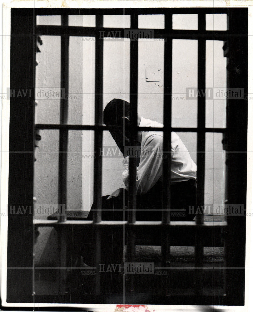 Press Photo Prison Hands on face Grief - Historic Images