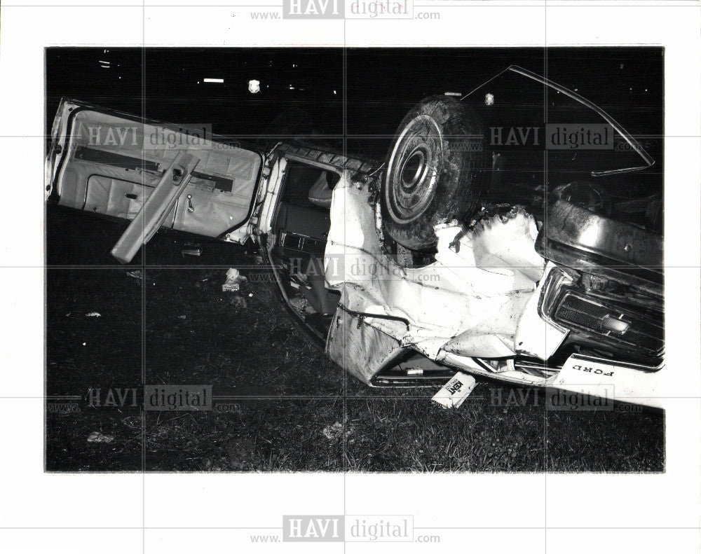 1976 Press Photo Buzun Reiss car crash rollover - Historic Images