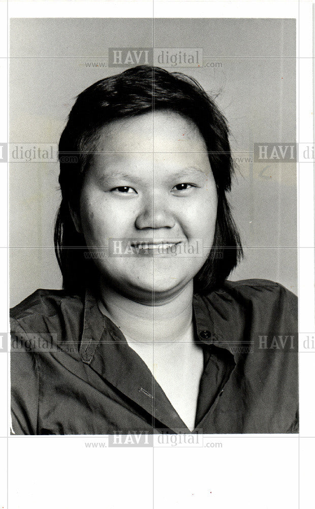 1985 Press Photo Lily eng editorial writer - Historic Images