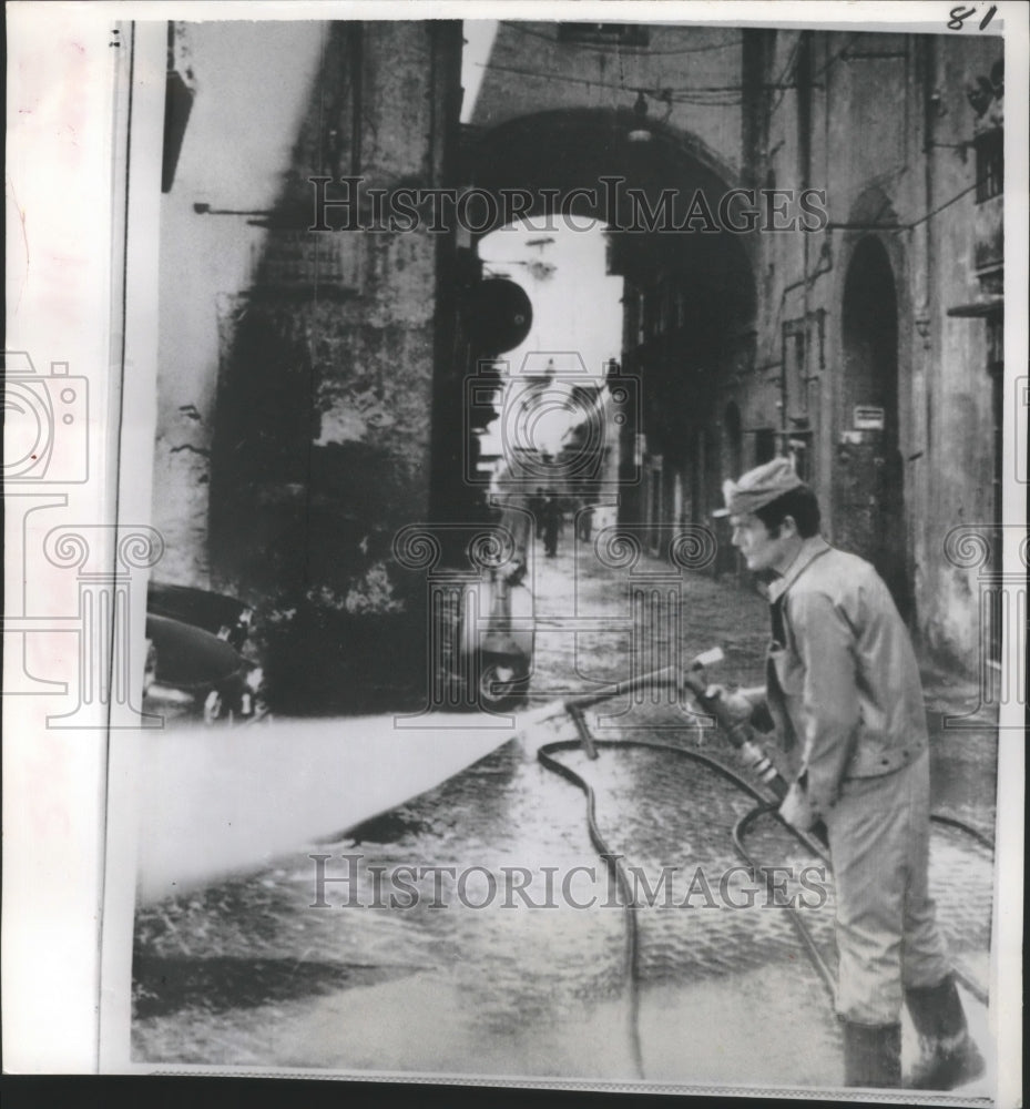 1973 Press Photo Naples, Italy Fireman Sprays Disinfectant for Cholera - Historic Images