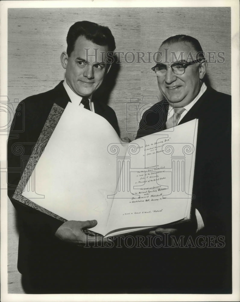 1961 Press Photo Two Unknown Men Showing Program - Historic Images