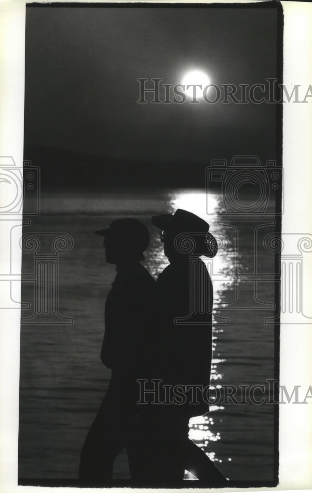 1993 Two Women with Hats Stroll Elliott Bay Near Sunsent  - Historic Images