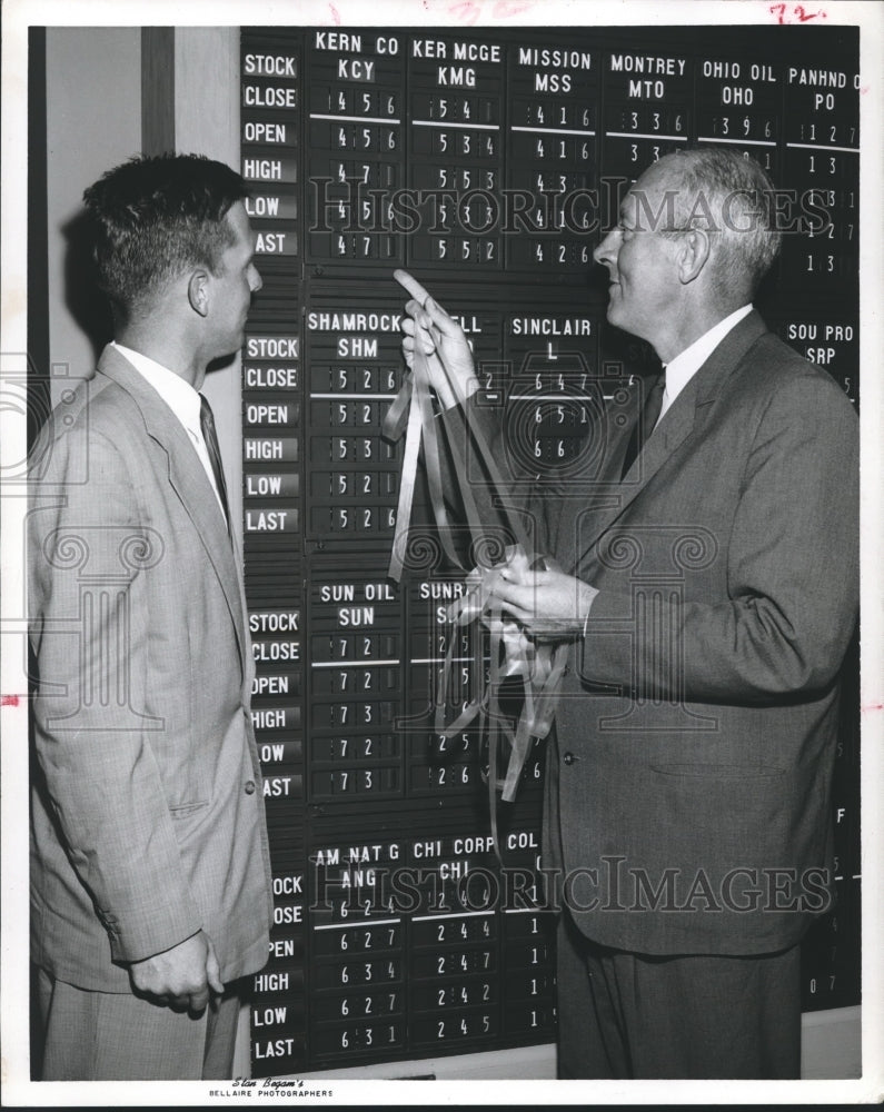 1956 Press Photo Stock Brokers look at charts - hca08302 - Historic Images