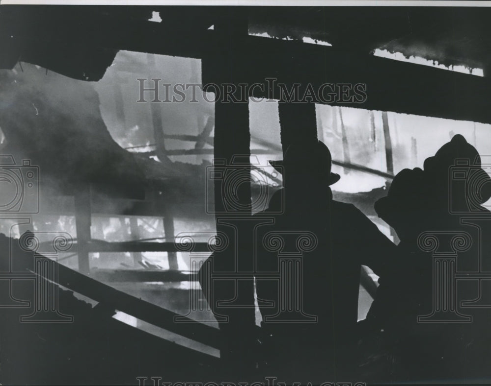 1964 Press Photo Fireman Fighting Fire at Bryson Lumber Co. - hca10585-Historic Images