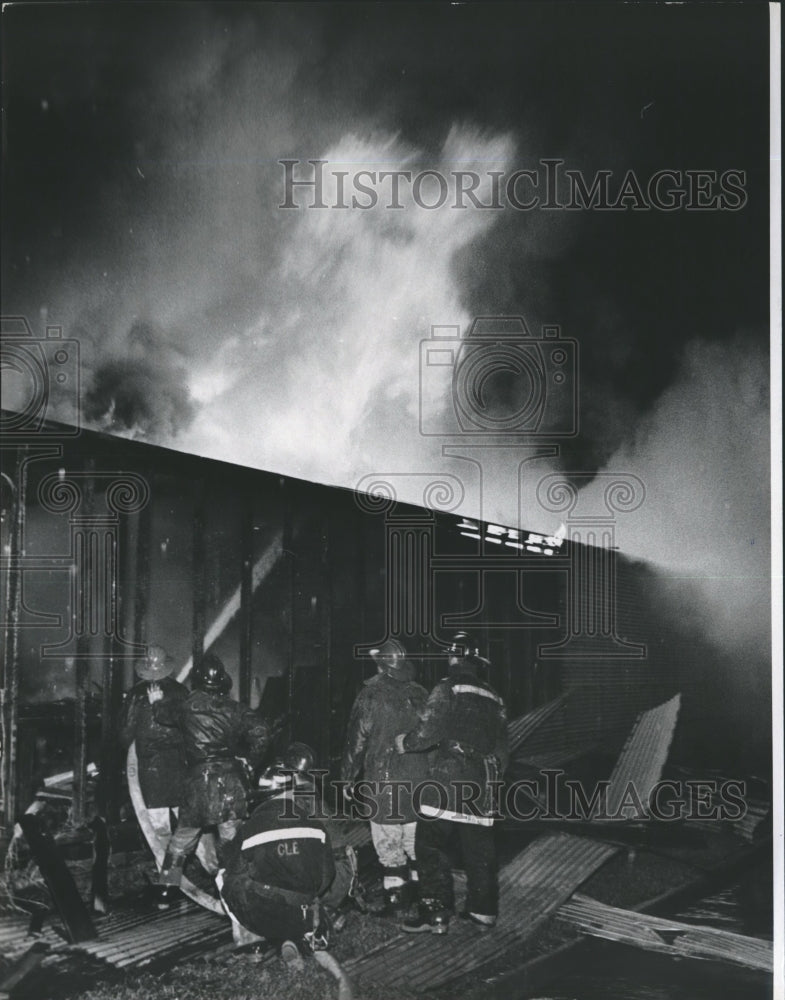 1964 Press Photo Fireman Spraying Water At Bryson Lumber Co. - hca11512- Historic Images