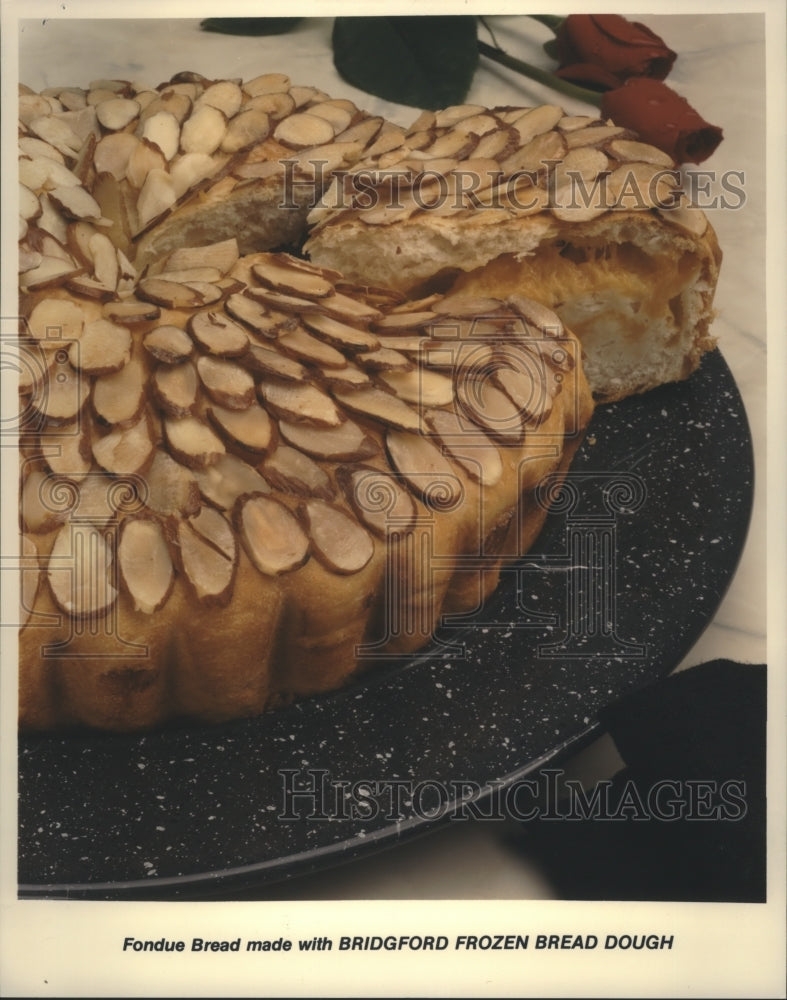 1996 Press Photo A slice of fondue bread - hca12764 - Historic Images