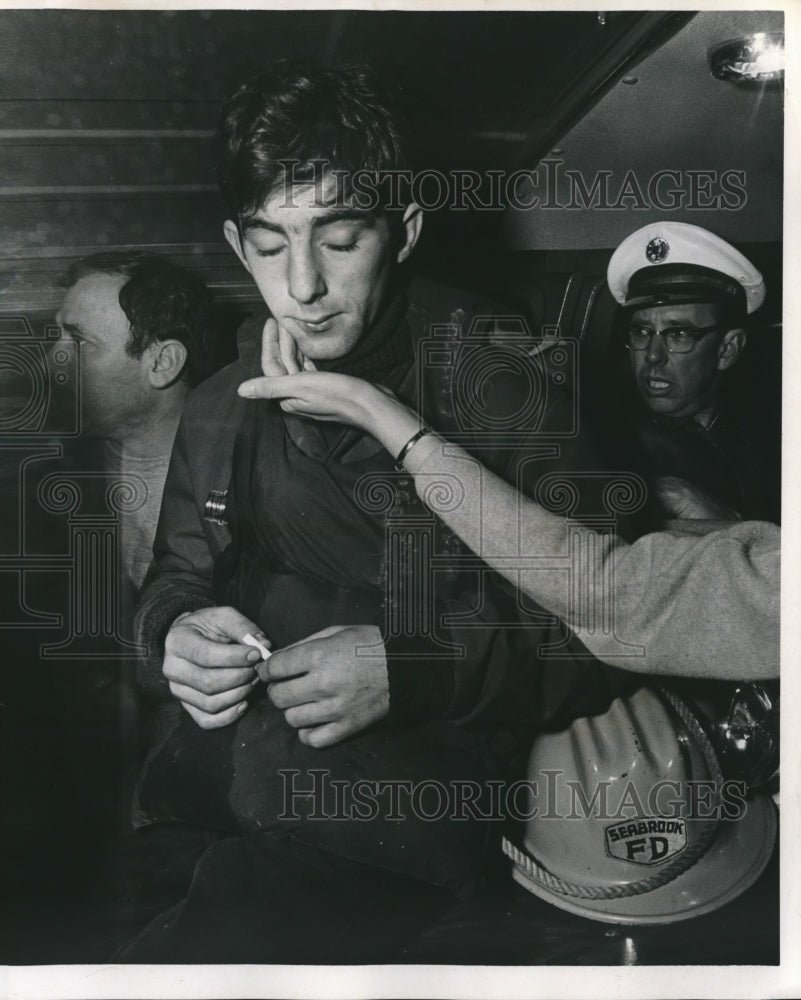 1968 Press Photo Christine Reaches Out to Seabrook Firefighter. - hca14455 - Historic Images