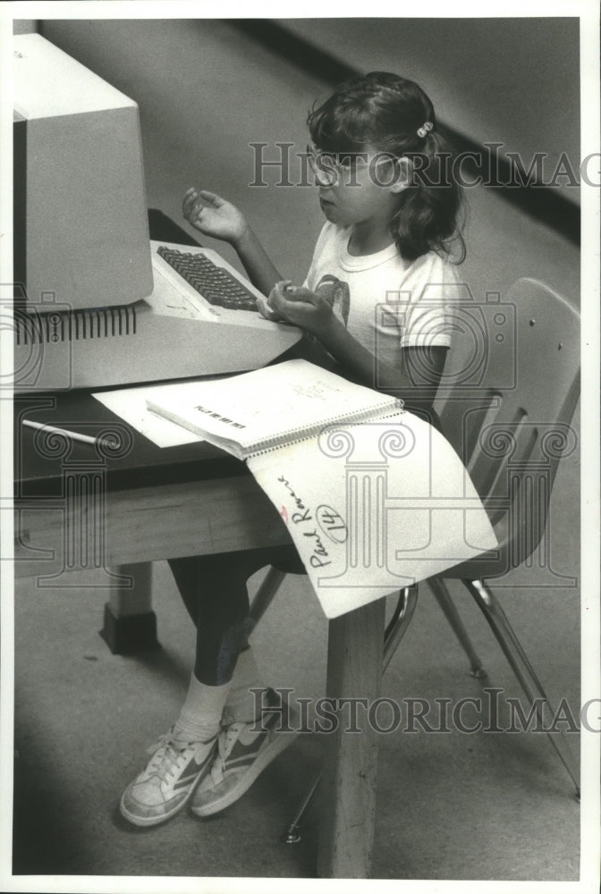 1983 Jenny Collyer works at terminal in HCC Computer class - Historic Images