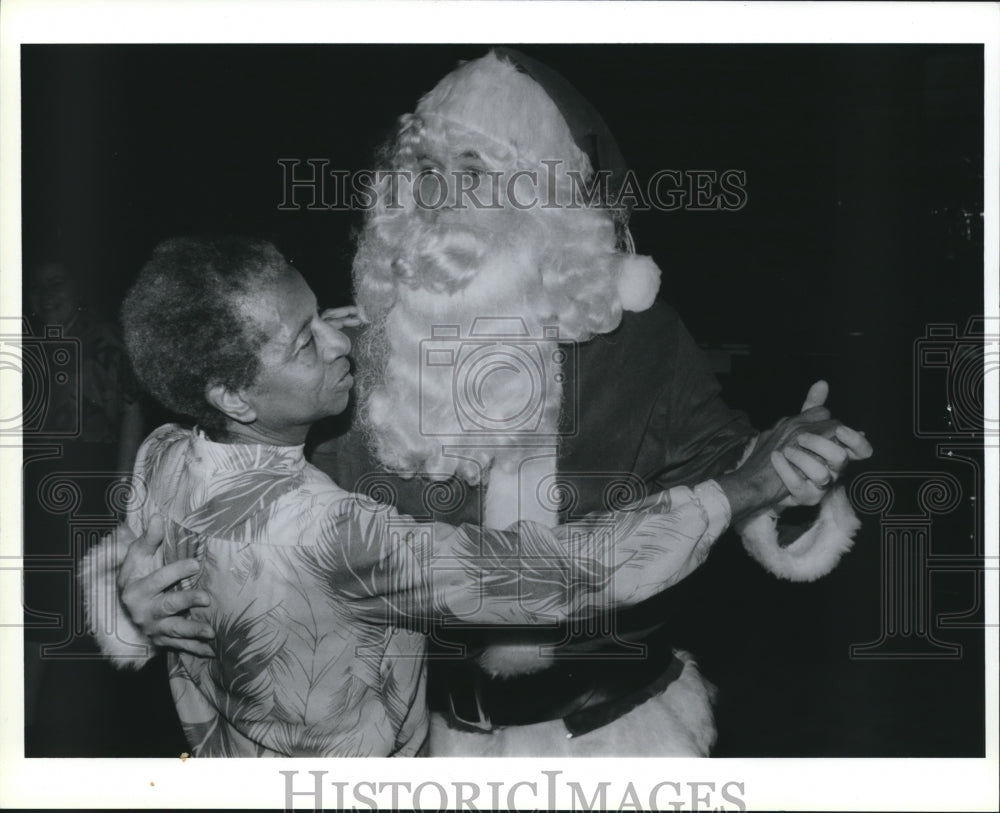 1988 Santa, Father Joseph Doyle and Ann Griffin Christmas in Houston - Historic Images