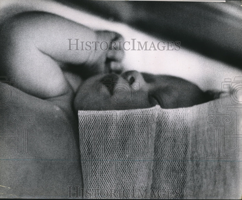 1964 Press Photo A Newborn Baby Nestled In A Blanket. - hca16272 - Historic Images