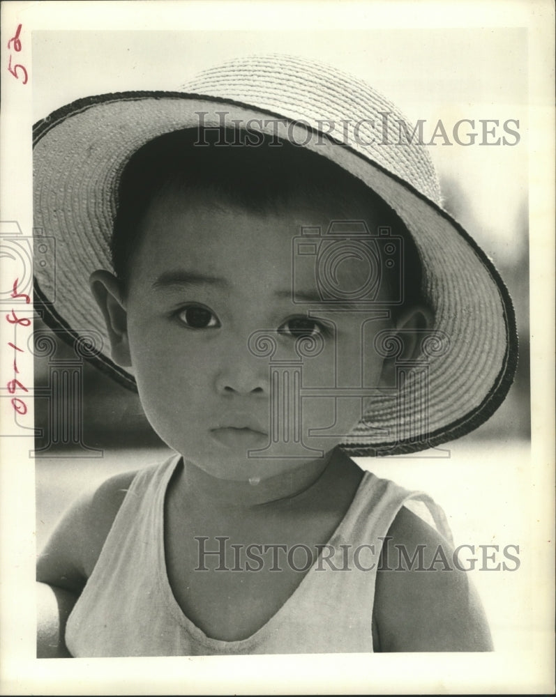 1974 Press Photo Child Wearing Hat From Red China. - hca16904 - Historic Images