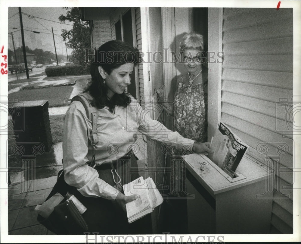 1983 Maxine McGill checks Marguerite O&#39;Bannon&#39;s mail, Carrier Alert - Historic Images