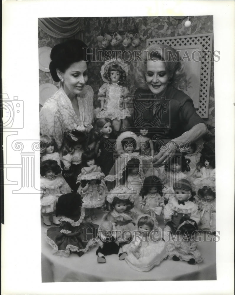 1989 Peggy Veazey and Judy Trammell with dolls owned by Nancy Veazey - Historic Images