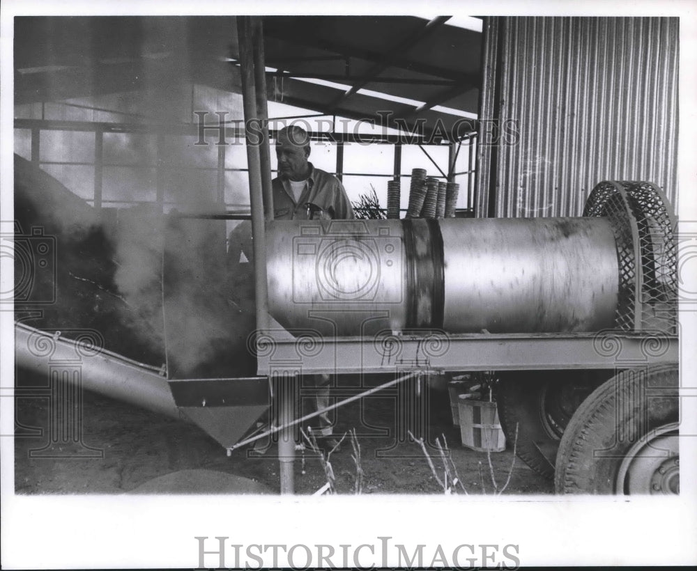 1967 Press Photo Jim Thorne With Soil Sterilizer at Flowerland Garden Center. - Historic Images