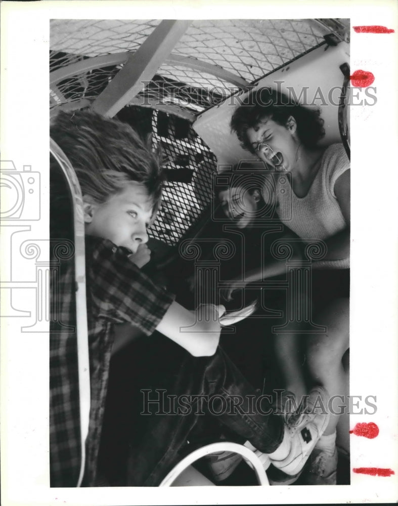 1985 Youngsters on ride at Fort Bend County Fair, Texas - Historic Images